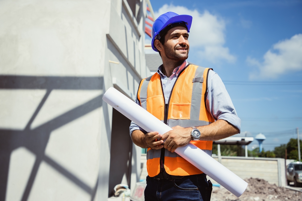 Handsome,Engineer,Man,And,Architect,Working,At,Construction,Site,With